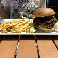 Baja Burger (order with NO cheese to make it vegan!) and very nicely seasoned fries  at Arbor Brewing Plymouth Taproom in Plymouth