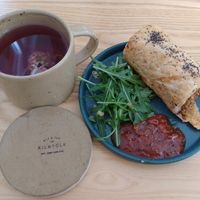 Lavender blueberry tea and the vegan sausage roll at Kilnfolk Coffee in Sheffield