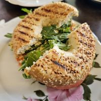 Bagel with hummus, tomato and rocket at Café Hüftgold in Dusseldorf