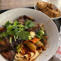 Aubergine noodles with a side of braised tofu at Biang Biang in Berlin
