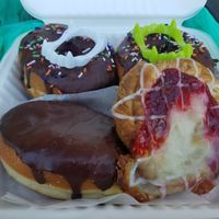 Fried donuts, Boston creme fried donut, and strawberry cream cheese Danish  at Reverie Bakeshop in Richardson