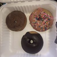 Strawberry glazed, chocolate glazed, and cinnamon cake donut!! at Reverie Bakeshop in Richardson