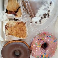 Berry and peach cobbler bar, gluten-free chocolate pie, sopapilla bar (AMAZING), strawberry and chocolate cake donuts at Reverie Bakeshop in Richardson