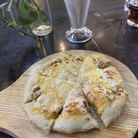 Four cheese pizza and an incredible popcorn milkshakee  at Mamma Pizza Vegana in Mexico City