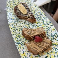 front: banana bread (very yummy!!) and in the back: toast with chocolate and nuts  at Così Com'era in Alberobello