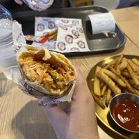 Burrito with avocado, chilli sauce and rice. Plus fries  at Maximo Burrito - 멕시모부리또 in Suwon