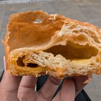 Inside the cheese and pesto bun at Okja in East London