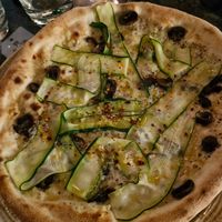 ZUCCHINE E TARTUFO: White base, soy truffle cream, courgette ribbons, vegan mozzarella-style cheese, chestnut mushrooms, chilli & basill at Piccolino in Wilmslow