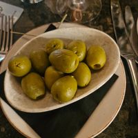 Pitted Gordal olives, marinated with guindilla chillies at Piccolino in Wilmslow