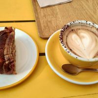 Vegan pay cappuccino and vagan banana bread at Panistas Inconformistas del Pan in Santander