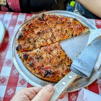 Kids cheese pizza with vegan cheese at Del's Pizzeria in Pismo Beach