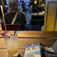 Lime and ginger soda and street view seating  at Madame Musur in Bangkok