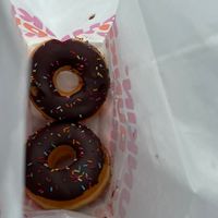 Rainbow sprinkles on chocolate.   at Dunkin - Friedrichstraße in Berlin