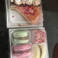 Assorted macarons, hazelnut Opera cake, strawberry cake at Bakenary at 124 Street Grand Market in Edmonton