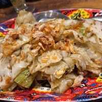 Stir Fried Charred Cabbage with Soy Sauce and Sichuan Spice Mix at Thai Niyom Cuisine in Bangkok