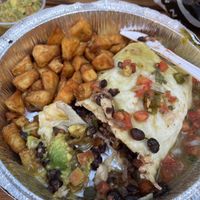 Verde burrito to-go with no sour cream  at Oscar's Cafe in Springdale