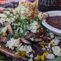 Some of the people here know what vegan means. 

But dude, order the nachos without cheese and add rice and portobello mushroom. They need vegan items like this on the menu! at Oscar's Cafe in Springdale