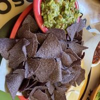 Huge basket of chips, plus a bowl of guac   at Oscar's Cafe in Springdale