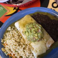 Sweet potato burrito with beans and rice and guacamole  at Oscar's Cafe in Springdale