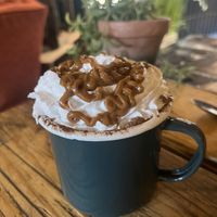 Biscoff hot choc with coconut milk   at Haystack Cafe in Merthyr Tydfil