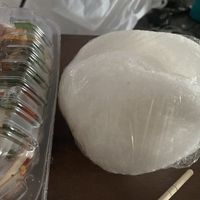 The rice crackers that come with the salad, put some salad on top and eat it or crack them into the salad  at Tang's Asian Vegetarian in San Jose