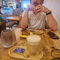 Oat latte and banana cake (vg, gf) at Yellow Bourbon in Faro