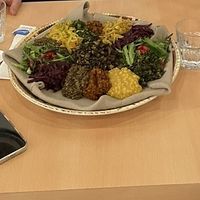 Injera sampler with mushroom tibs  at 13 SUNS Ethiopian Café & Eatery in Toronto