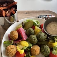 falafels quantum field salad and a side of sweet potato fries  at Big Bang Café in Meyrin