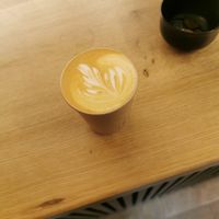 oat flat white at Klobouk dolů coffee in Cesky Krumlov