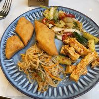 lunch sides buffet: fried bread, kimchi, cucumber & tofu salad, noodle salad   at Uyghur Noodle House in Helsinki