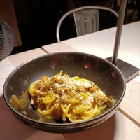 Spaghettoni con ragù di carciofi at Zoi Bakery in Arese
