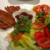 Veggie Crispy Duck. The vegan duck is good, but there is not much else on the plate. at Quan Bo De Cuisine Vegetarienne in Montreal