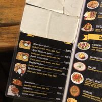 la carta incluye muchos platos veganos de verduras  at Fast Food Kasandro in Sarande
