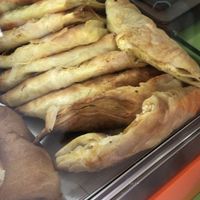 Tienen byreks de diferentes sabores por sólo 100 leks cada uno. El de cebolla y tomate es el único vegano y estaba buenísimo  at Peta Jon in Sarande