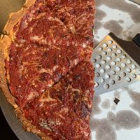 Deep dish with roasted garlic and Daiya cheese  at Crust 54 - Downtown in Holland