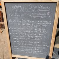 Notice board at Piccolo  in Leighton Buzzard