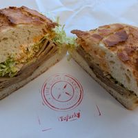 Tofurky Roasted Turk'y deli slices, Vegenaise, lettuce, and red Italian dressing on a Dutch Crunch Roll at The Baker's Mark in Portland