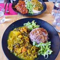 Top: Aubergine, Couscous. Bottom: Vegetable curry, onion Rice at Orient Experience in Venice