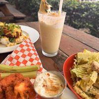 Wings, Krabby cakes, Pina colada, caesar salad! Everything is so crispy, so delicious. If I lived in hawai’i this would be somewhere I’d come every day!  at 9th Island in Haleiwa