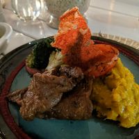 Vegan steak with puree and grilled veg at Isla Grill in Puerto Ayora