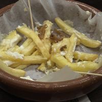 Half eaten vegan friesd  at Afterlife eSports Gamer Bar in Barcelona