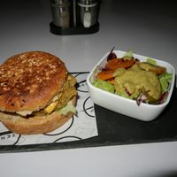 Veganized burger with dairy cheese. at El Manso Boutique Hostel Restaurant in Guayaquil