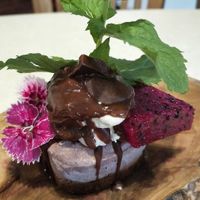 Home grown dragon fruit, cashew berry cheesecake, coconut yoghurt & tahini & cacao chocolate at Gold Coast Insight Retreats in Tallebudgera