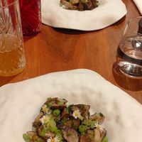 Porcini mushrooms with green onions & edible flowers at Auberge Des Aryelets in Aulon