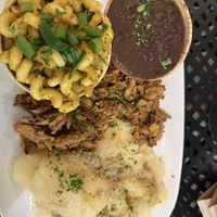 Mojo pork, black beans, yucca, Mac and cheese  at A Lo Vegano Orlando in Orlando
