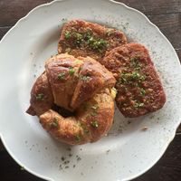Croissant breakfast with a side of hash browns   at A Lo Vegano Orlando in Orlando