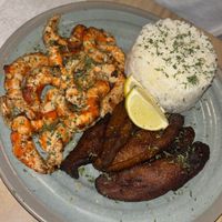 Garlic shrimp meal with jasmine rice and plantains well done   at A Lo Vegano Orlando in Orlando