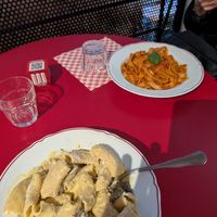 A vegetarian fungi and vegan tomato pasta at Miscusi - Milano Cadorna  in Milan