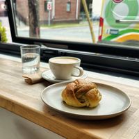 Flat white and a scallion bun at Bramble Cafe in Halifax