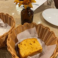 This bread has cheese. My mum ate it as she's not vegan. Remember to request for vegan bread, they have it.  at Roots Bistro KL in Kuala Lumpur